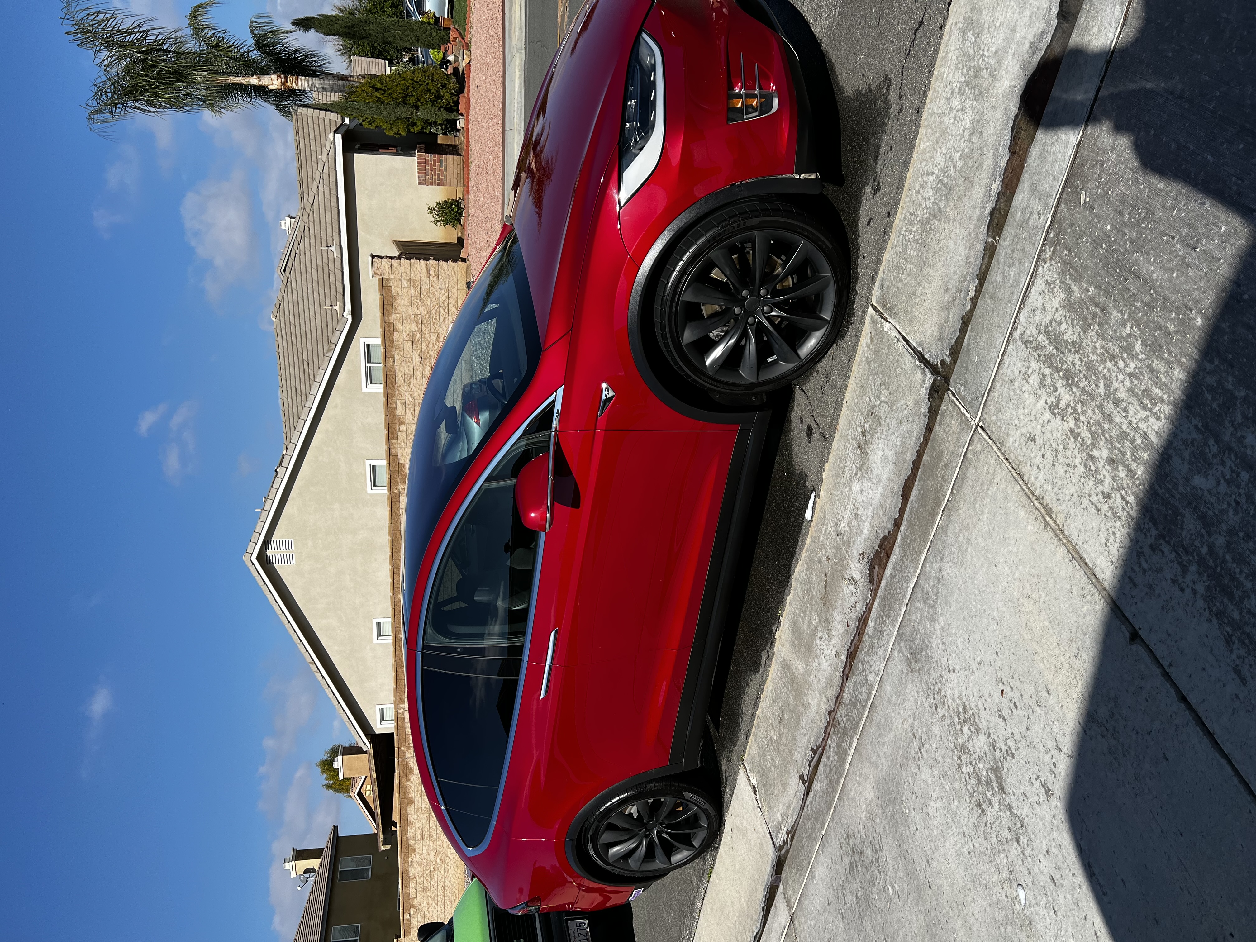 Red Tesla 1 Year Ceramic Coating Inspection